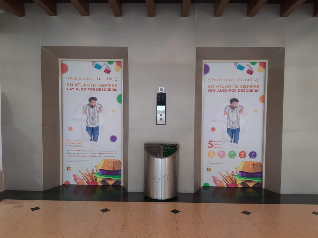 Vinilo puertas Ascensores Atlantis Plaza